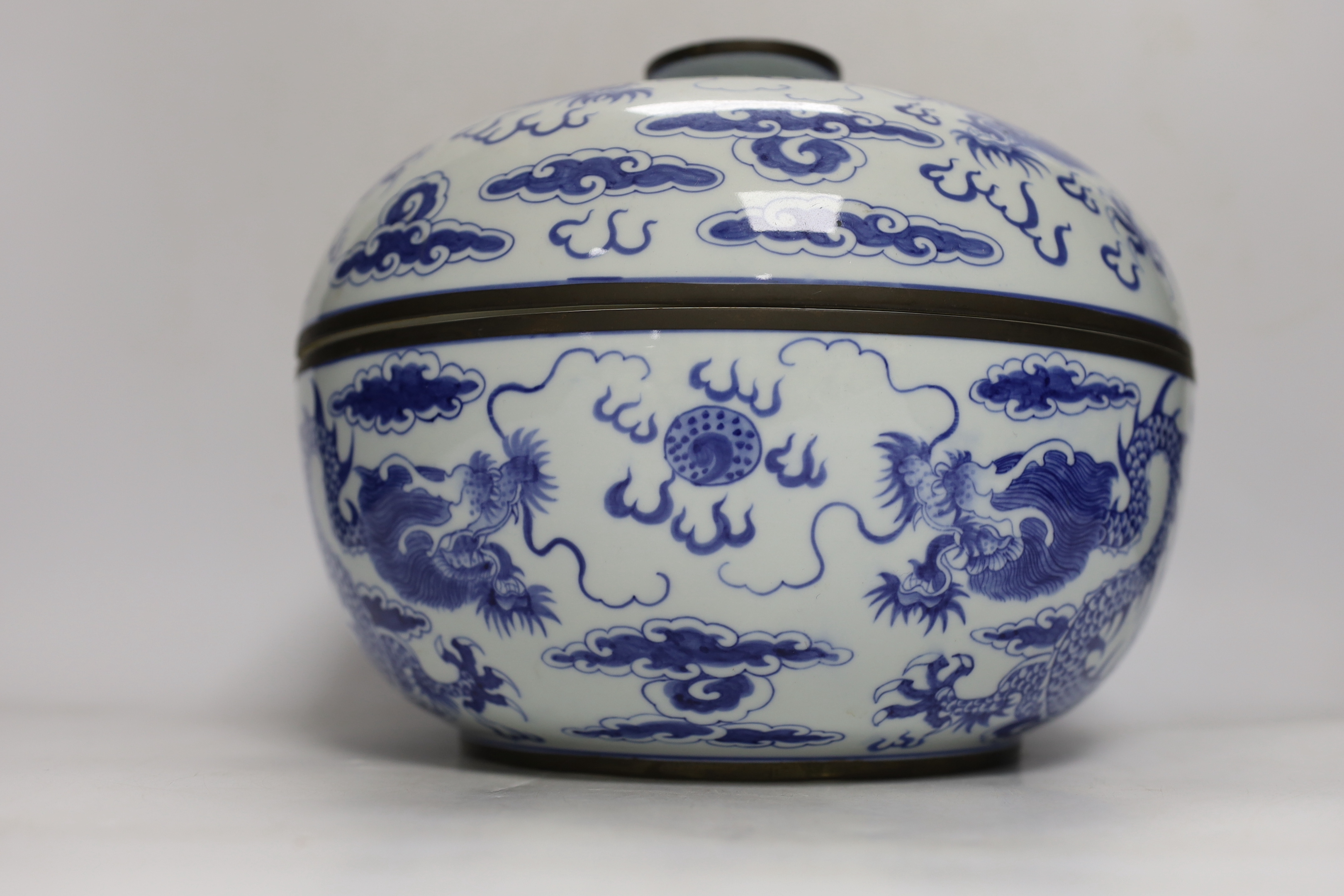 Four modern Chinese blue and white ceramic items; two teapots, a lidded vessel and a bowl, tallest 23.5cm